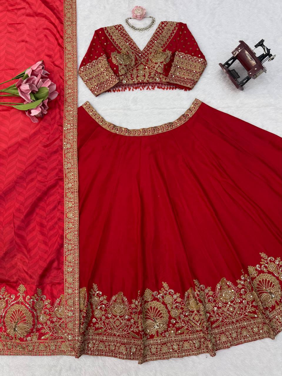 Regal Crimson Red Bridal Lehenga Choli Ensemble Featuring Intricate Gold Zari Embroidery, Heritage Motifs, and Embellished Tassels